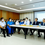 Safety Training Session**

"A brightly lit conference room in Bangkok, Thailand. Employees are attentively watching a safety demonstration by a trainer in appropriate business attire, fully clothed. The scene emphasizes workplace safety protocols and risk assessment. 'Safety First' banner visible. Safe for work, appropriate content, family-friendly, professional, perfect anatomy, correct proportions, natural pose, high-quality image."

**